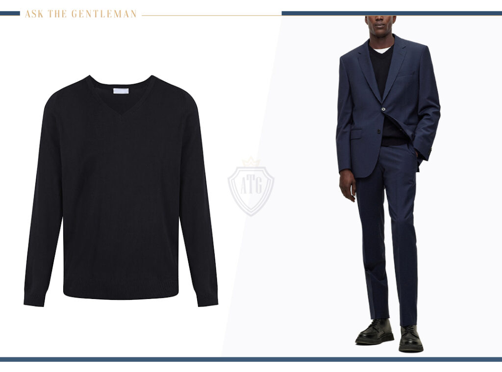 Wear a navy suit with a black v-neck sweater
