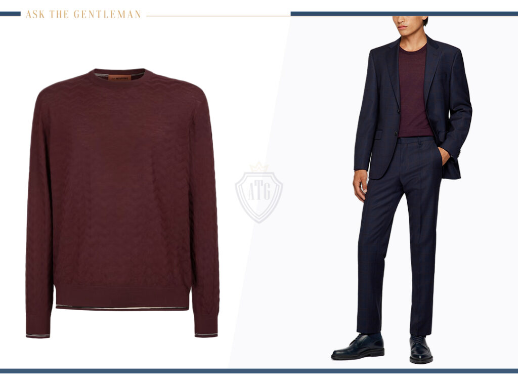 Wear a navy suit with a burgundy crew neck sweater