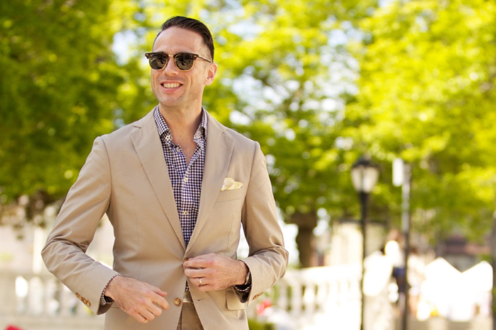 Wearing a khaki suit and a patterned shirt for a daytime summer wedding