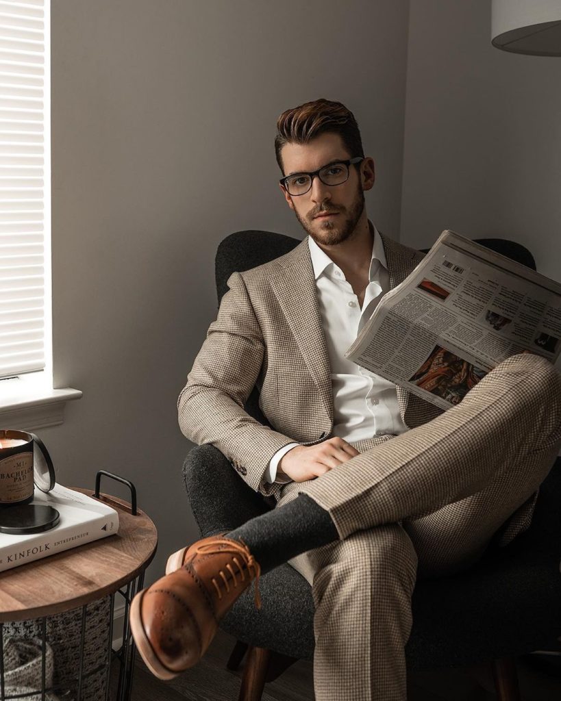 Wearing brown oxford dress shoes with a tan suit and white shirt