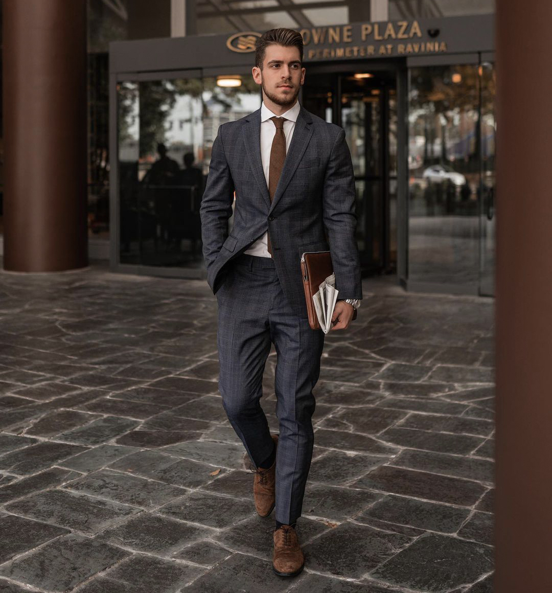 Wearing brown shoes with a charcoal grey suit 