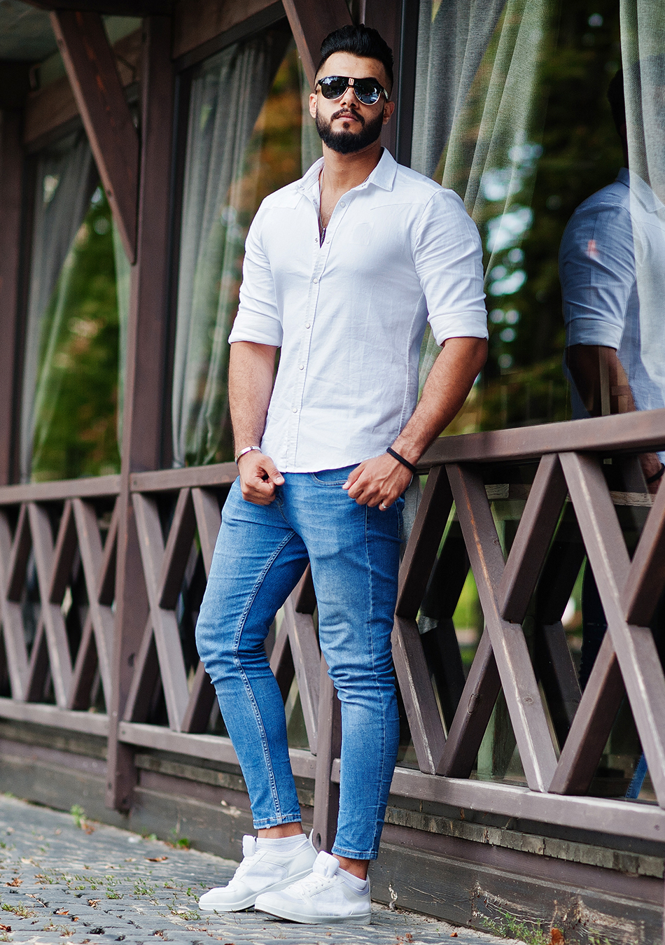 White dress shirt with mid-blue jeans 