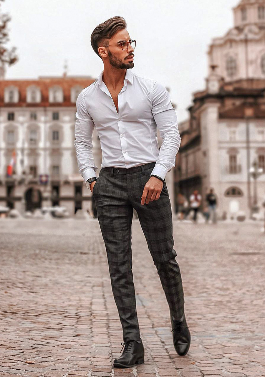 White shirt, grey plaid chino pants, and black Oxfords